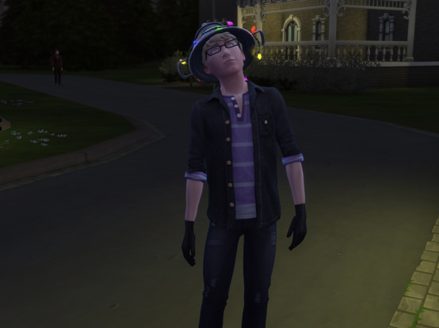 Boyd looking up at Vladislaus' mansion with the Vatore mansion behind him and Caleb Vatore in the distance